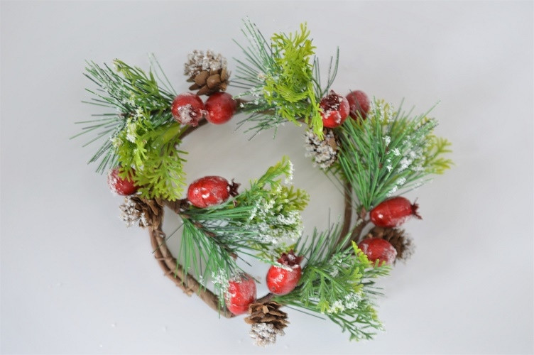 22079 -  Wintery wreath with a display of snowy pine needles, cones and large frosted berries. Floral decoration.  Size   Approx 23cm diameter