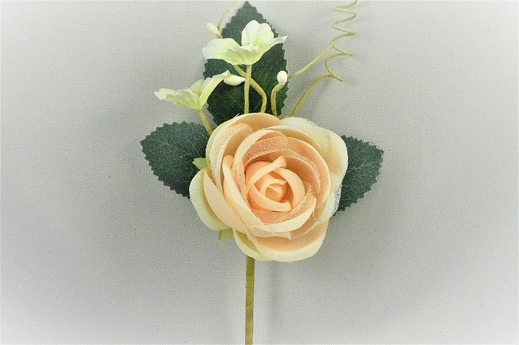 33013 - Soft Peach rose floral arrangement with delicate embellishments.  Height  16cms ,  Width  9cms   (approx)