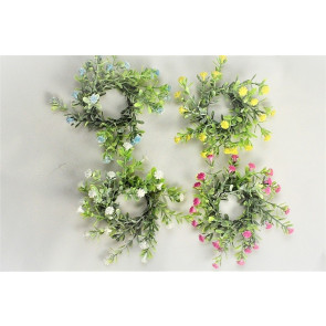 33019 - Delicate Spring flowers and leaves set in a circular floral arrangement. 