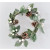 22058 - Wintery Christmas Wreath with pine needles and cones and white baubles with hints of sparkle.  Measures  280mm diameter